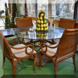 F70. Bamboo and glass top patio set.